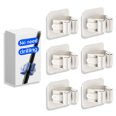 Gray 6-pack fishing rod holders mounted on a wall